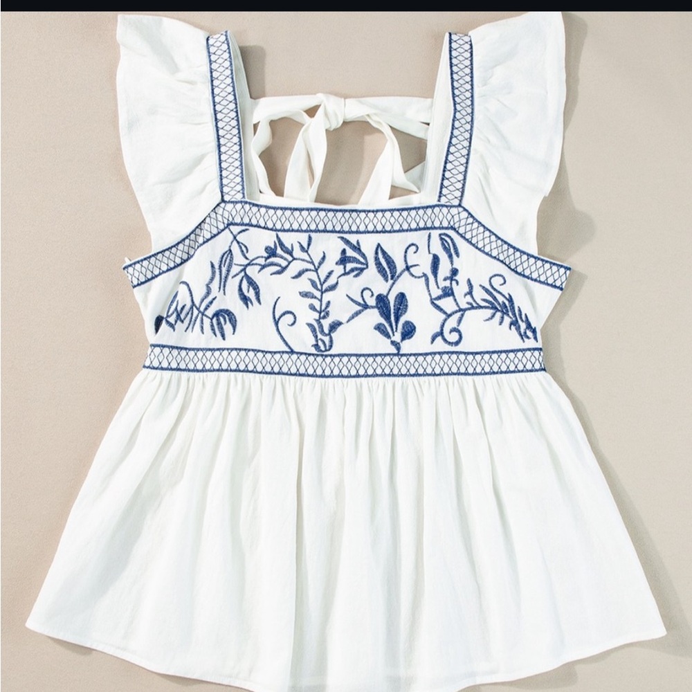 White Top with Blue Embroidery